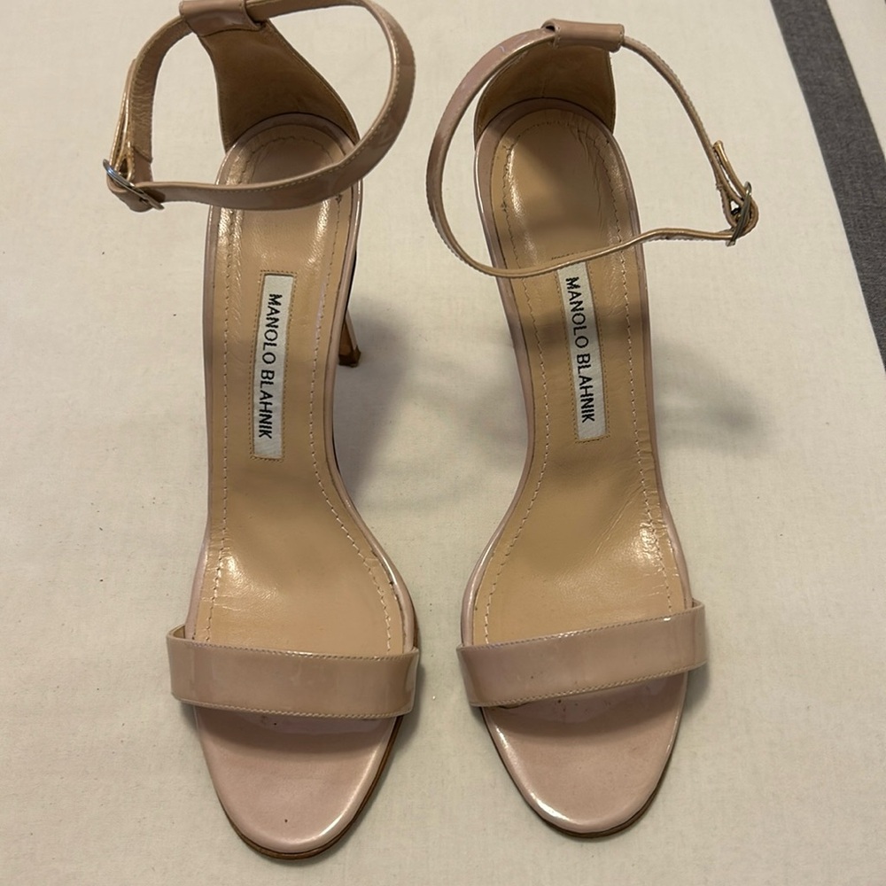 Manolo Blahnik nude sandals.
